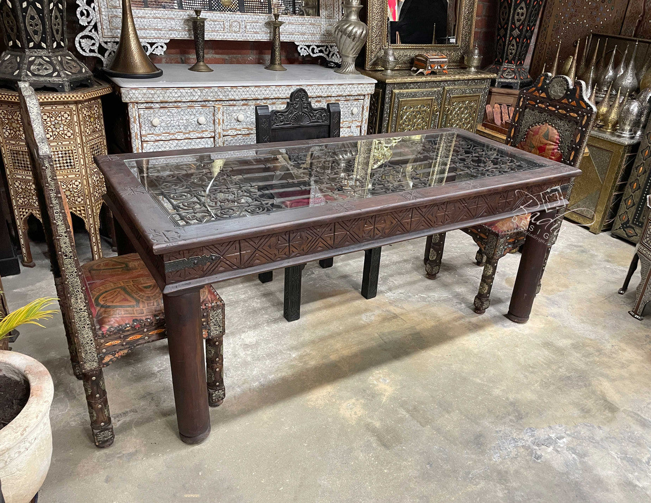 Carved Wood Dining Table with Wrought Iron Design
