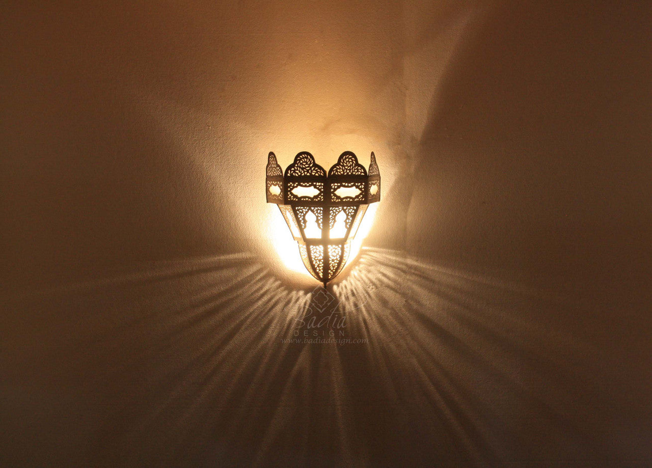 Intricately Designed Brass Wall Sconce with Soft White Glass