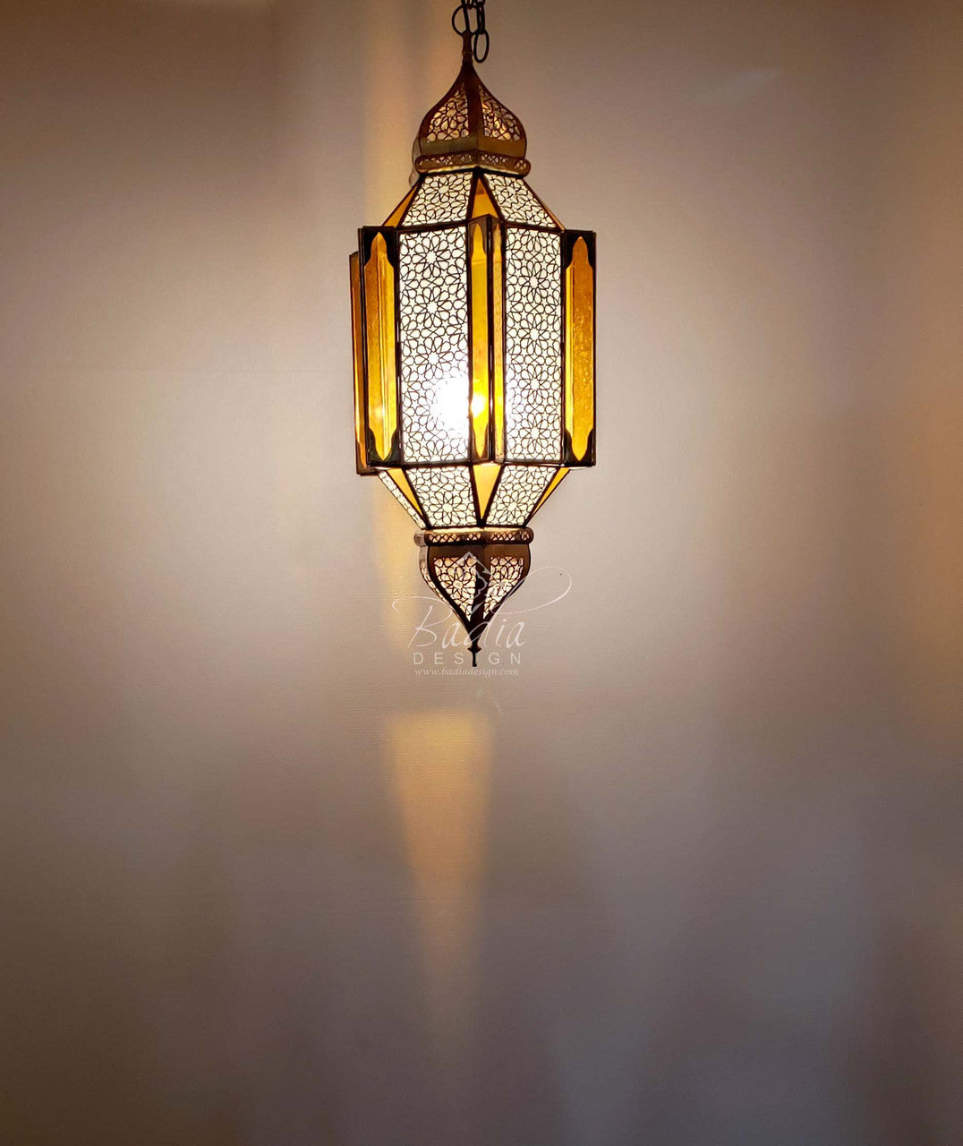 Intricately Designed Brass Chandelier with Amber Color Glass