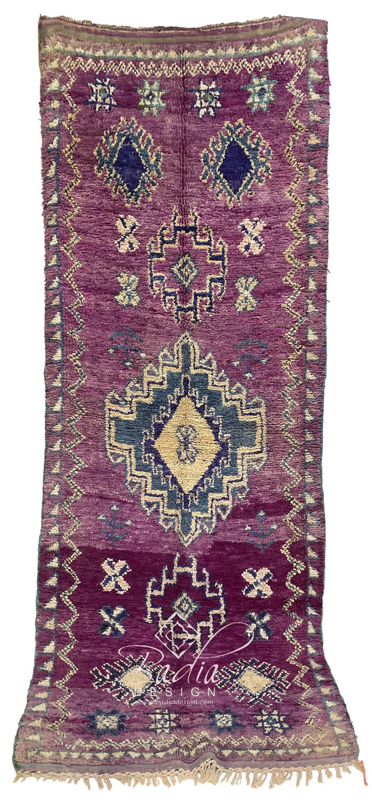 Purple Rug with Multicolor Geometric Patterns