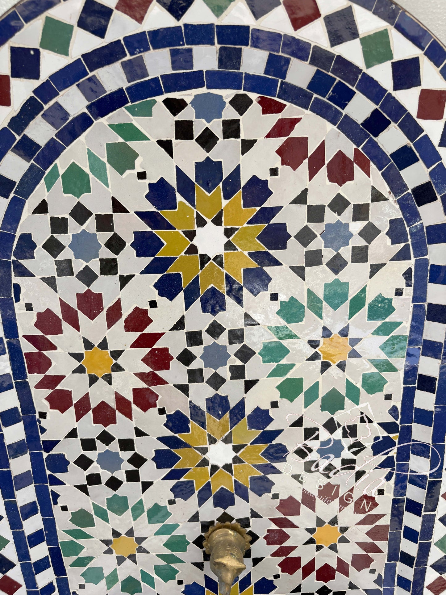 Multi-Color Water Fountain with an Arch Top